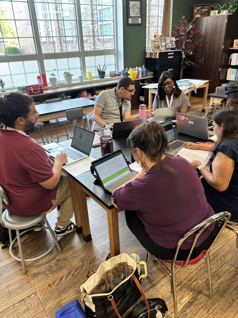 Teachers and staff attending professional development.