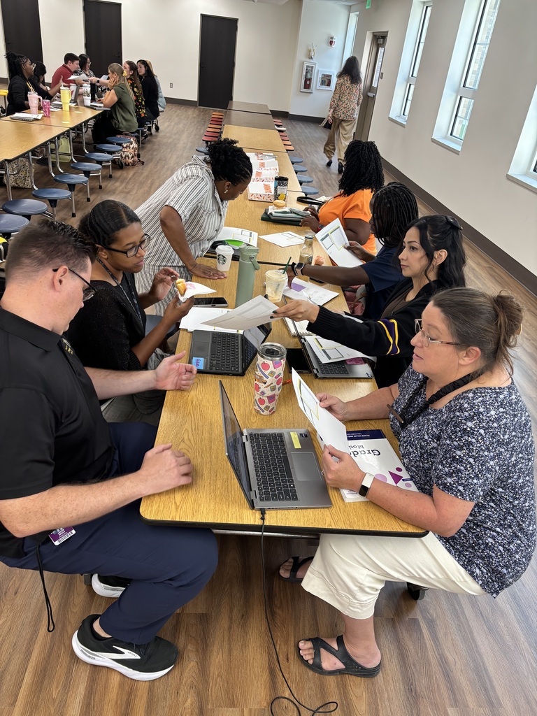 Teachers and staff attending professional development.
