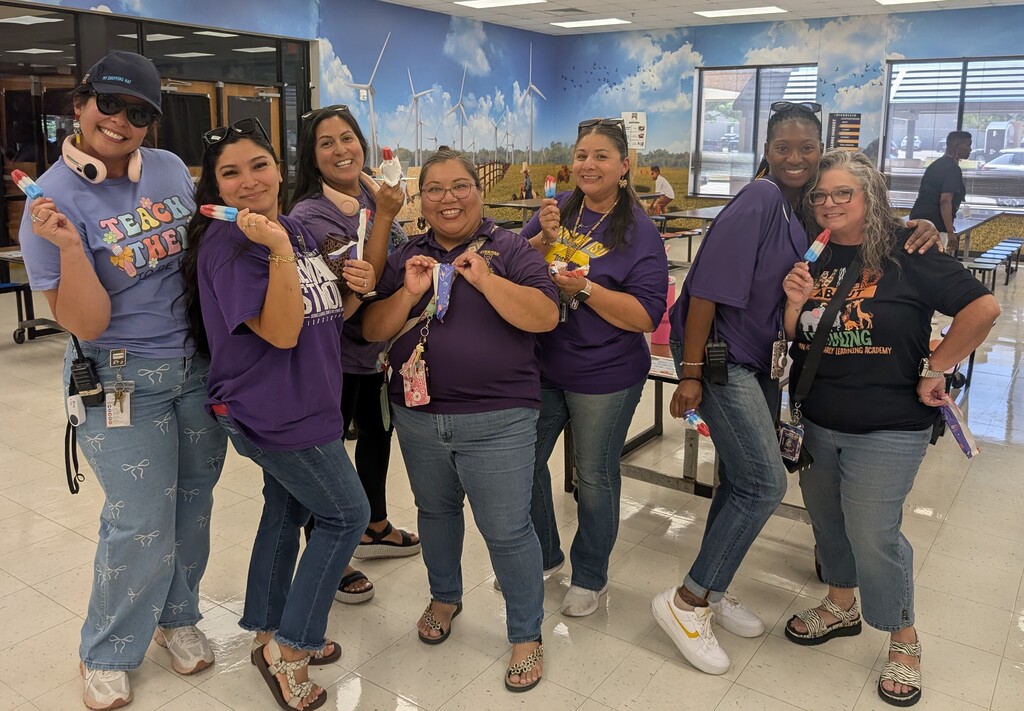 Group of teachers with popsicles.