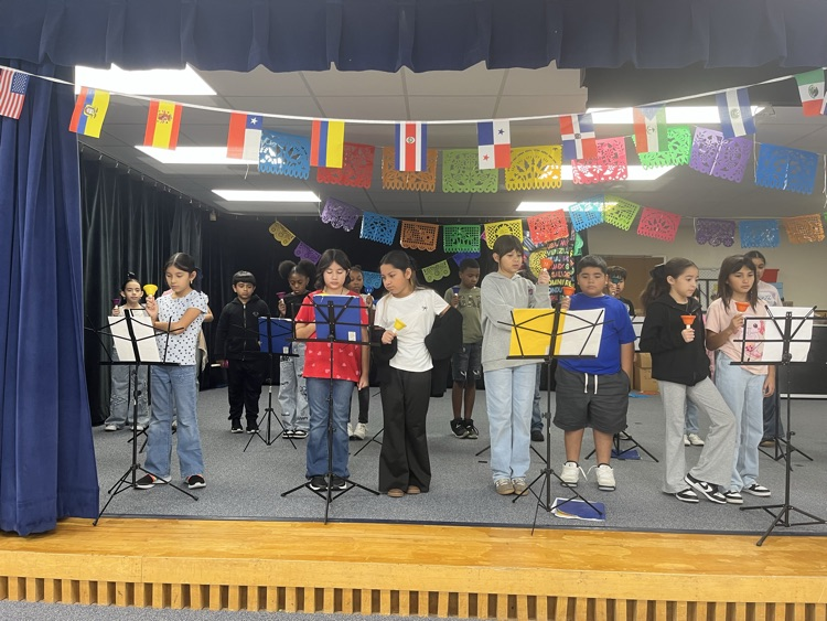 4th Grade practices with bells for their Hispanic Heritage Program!