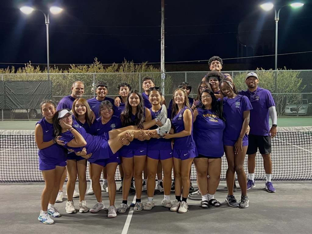 Everman High School Tennis team posing as they secured a playoff spot.