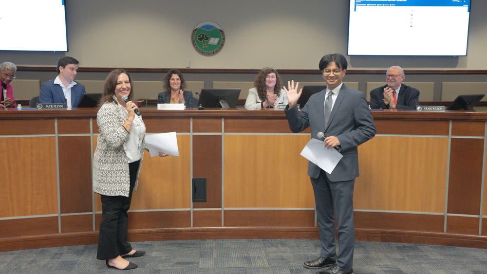 Superintendent Jennifer Sachs and new board trustee Kai Eusebio