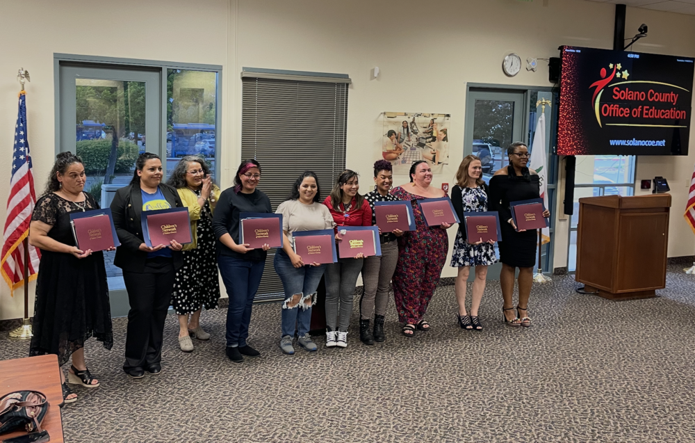 A group of Parent Leaders posing for a photo