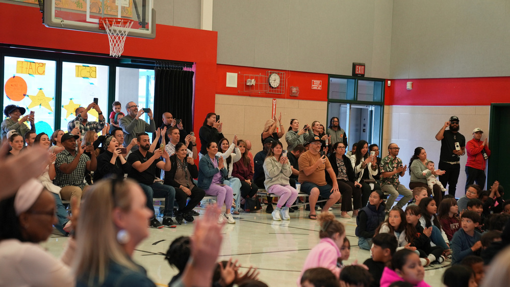 Parents praising during assembly