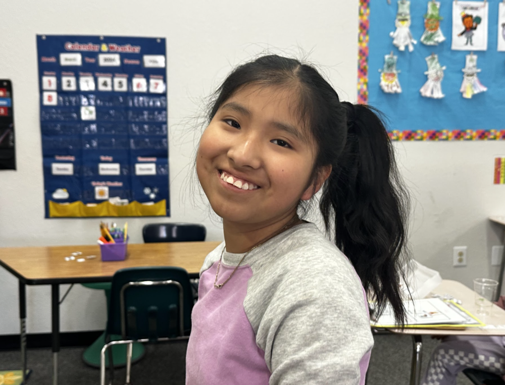 Young student of the month girl smiling