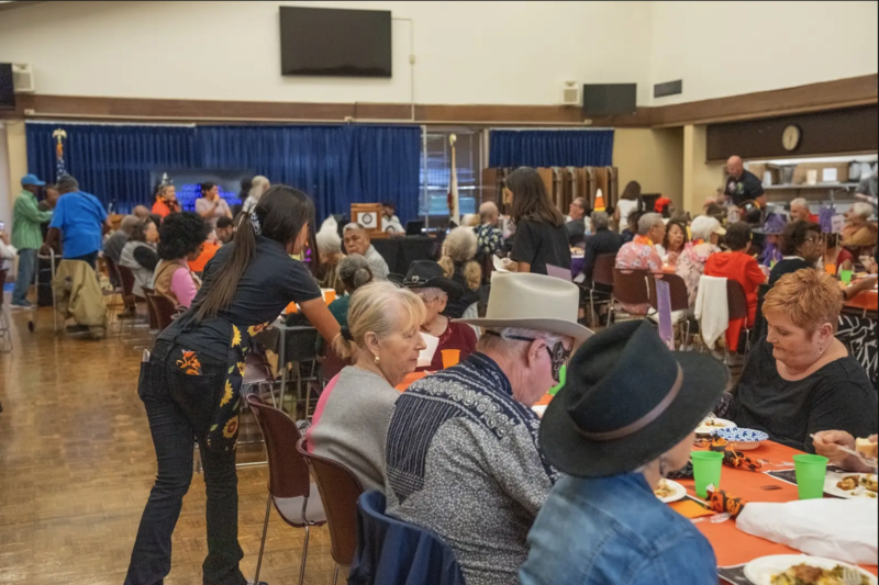 A picture of the full gym for the Sppoktacular Karaoke Luncheon