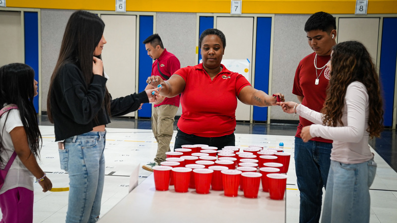 A group of students particiapting in an engaging STEAM activity during Family STEAM Night at Sullivan Language Immersion