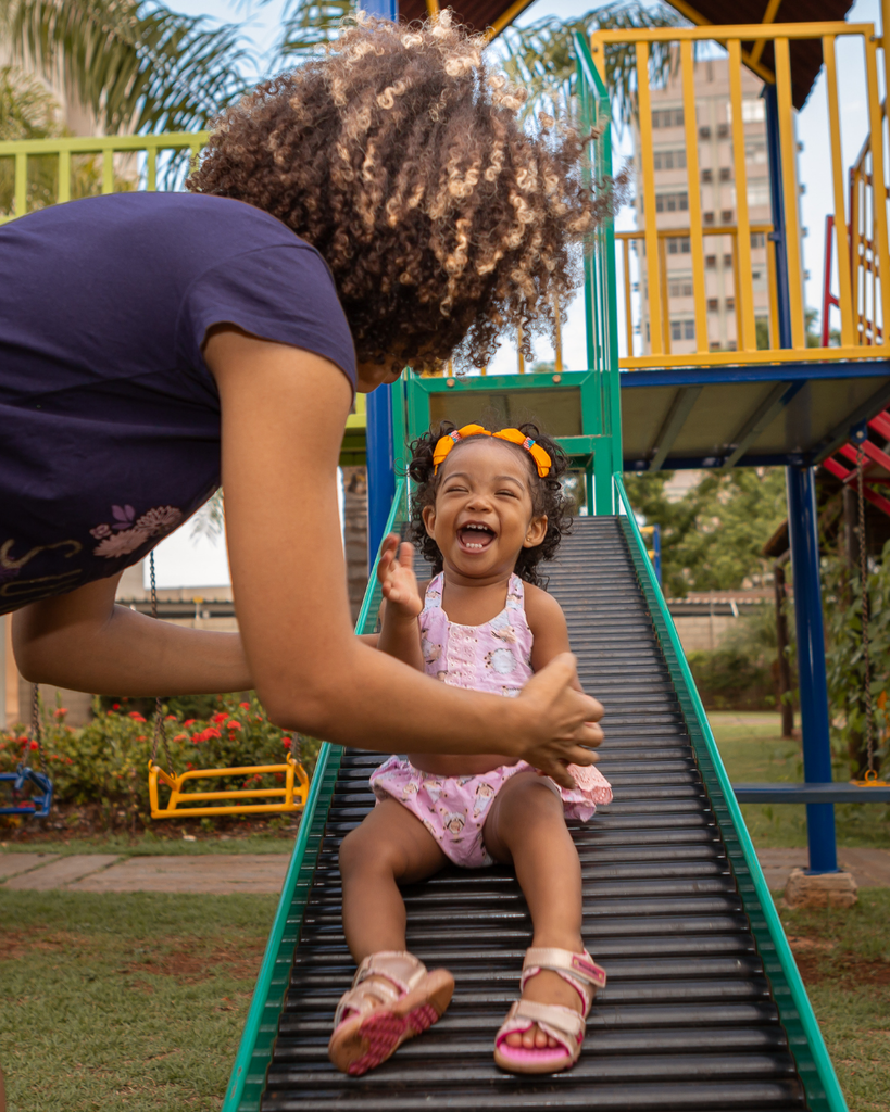 family playing at park