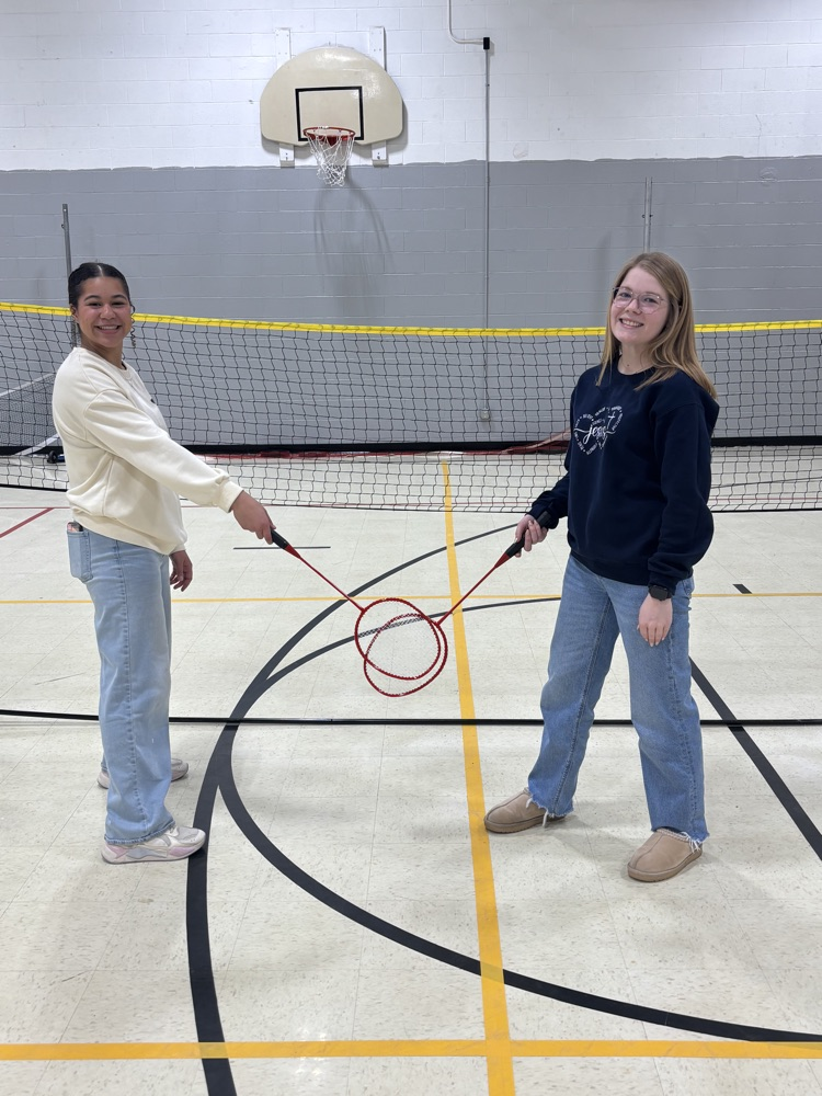students playing badminton