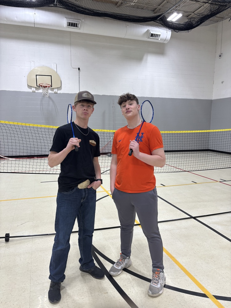 students playing badminton