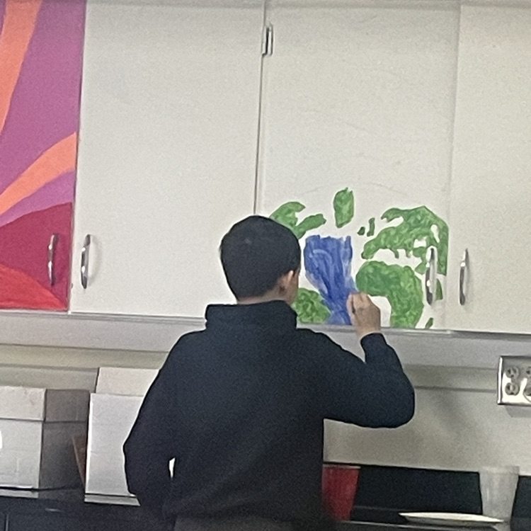 student painting 