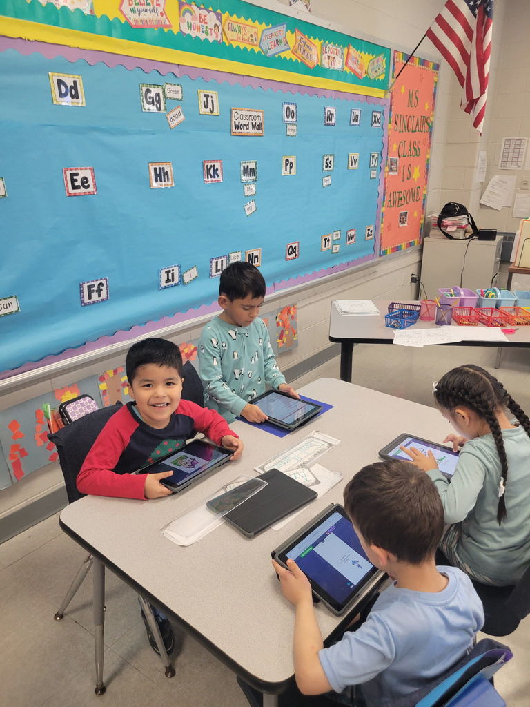 Kindergarteners hard at work exploring new skills and ideas!