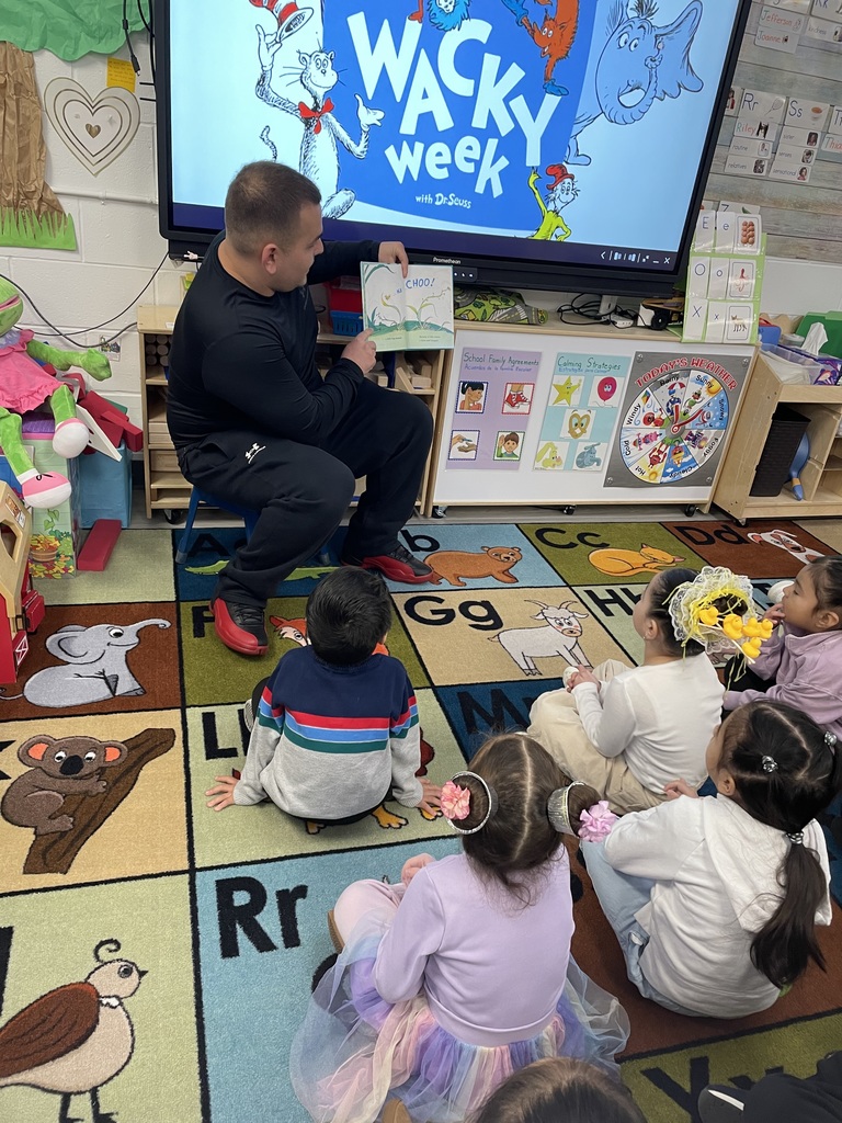 Mr. Holzapfel reading to the class for Read Across America Week!