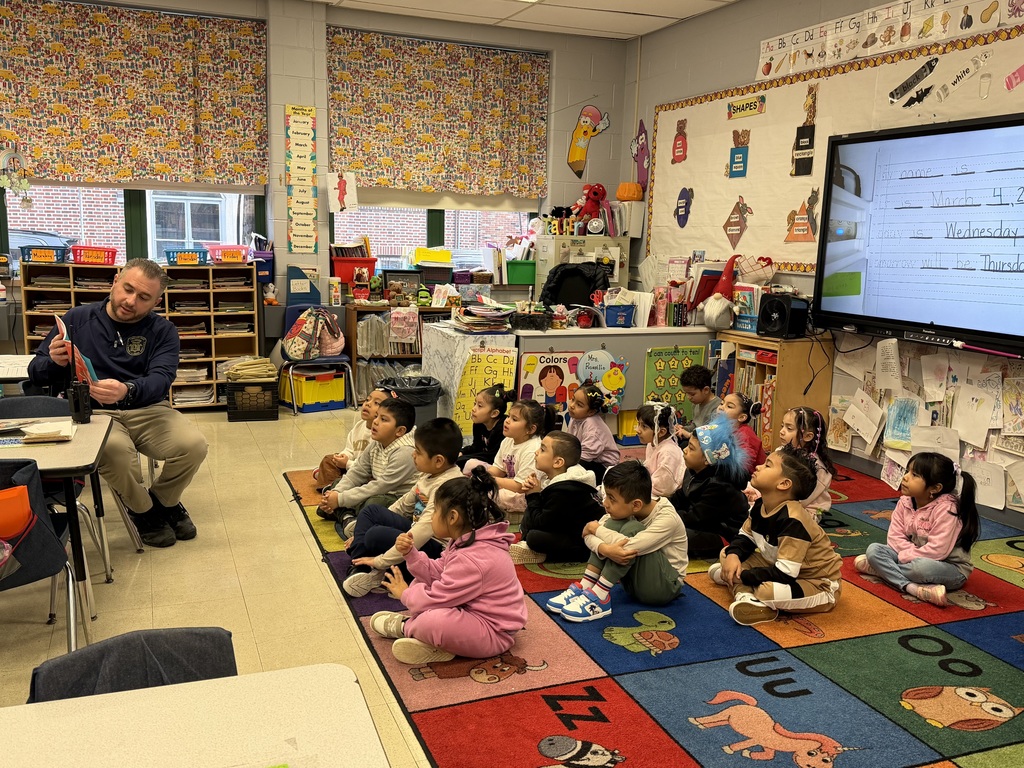 Captain Sabatino reading to the class for Read Across America Week!