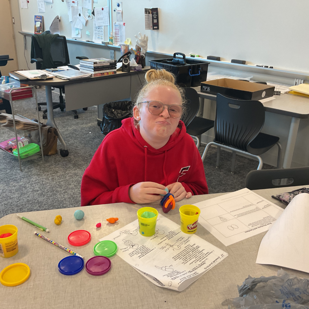 One girls making Play-Doh brains