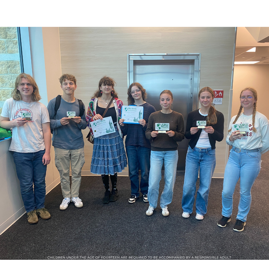7 students holding a winning certificate