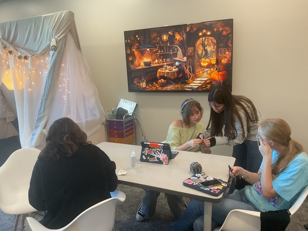 student helping another student