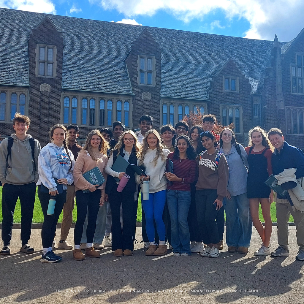 students standing in front of a building at Mercyhurst University