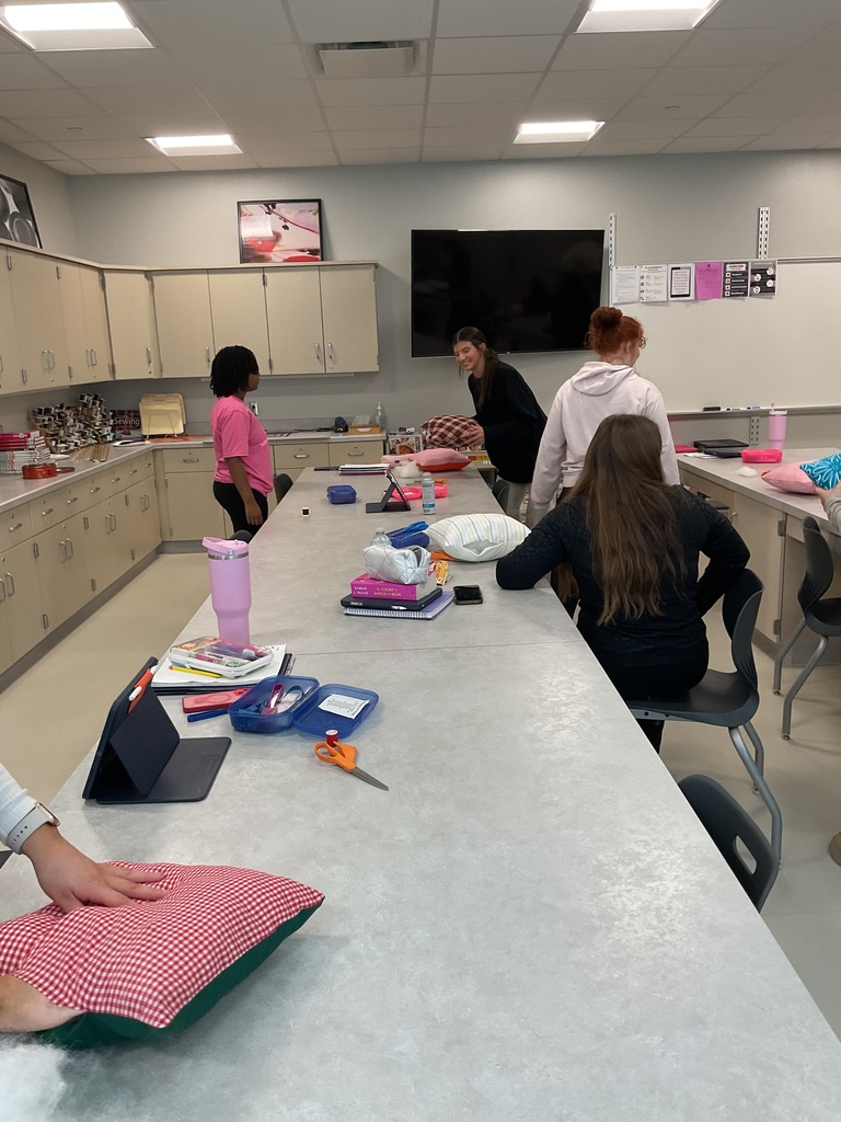 students making pillows
