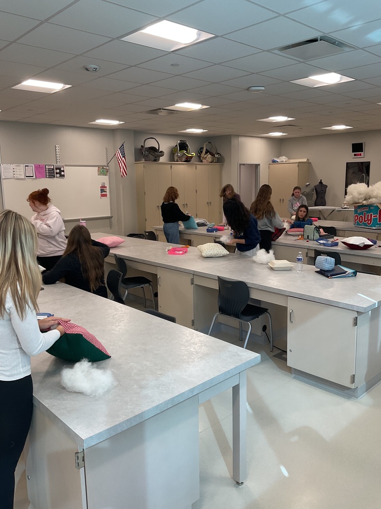 students making pillows