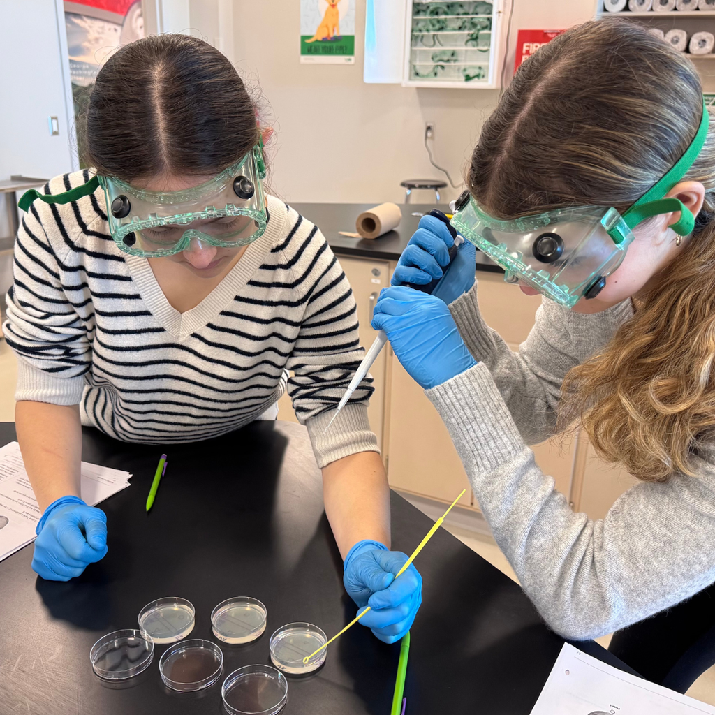 2 students with petri dish