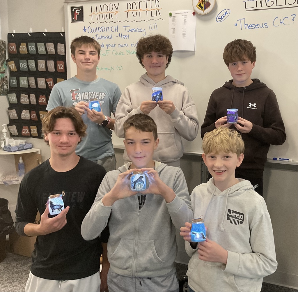 students holding glasses