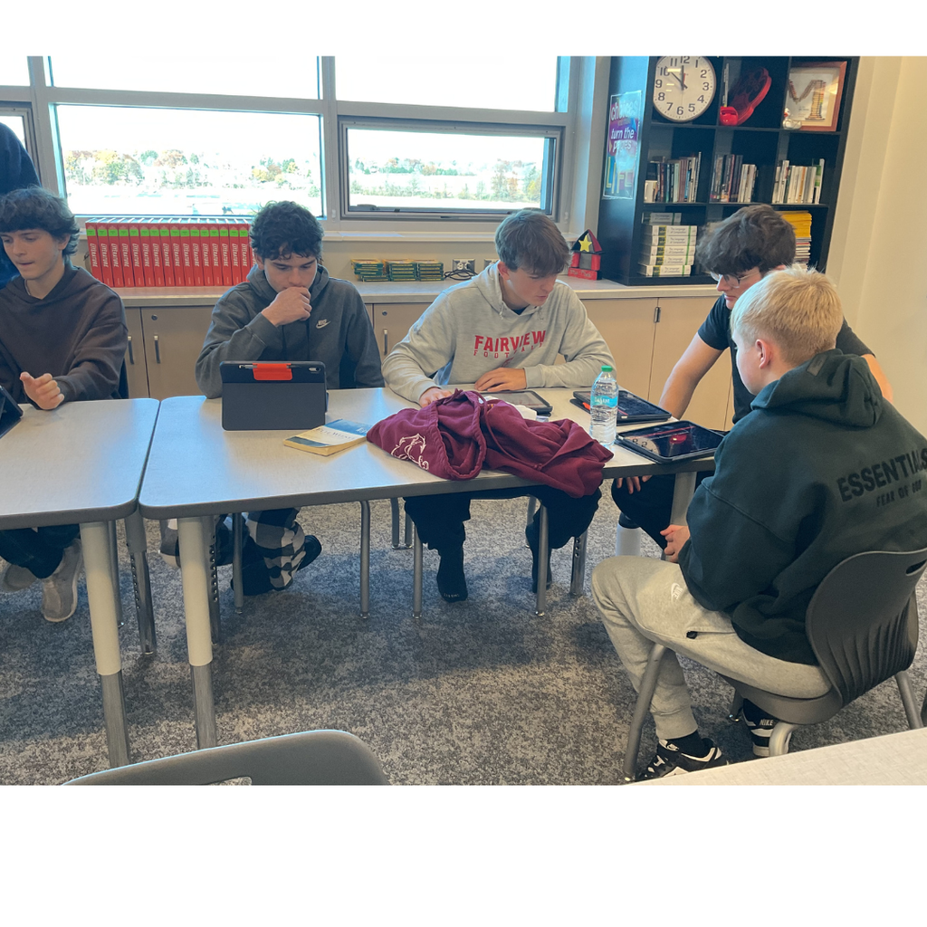 5 students working on ipads