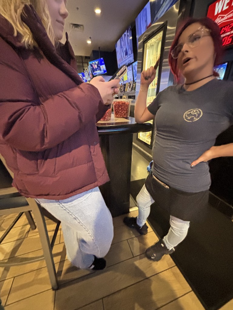 student asking a employee a question