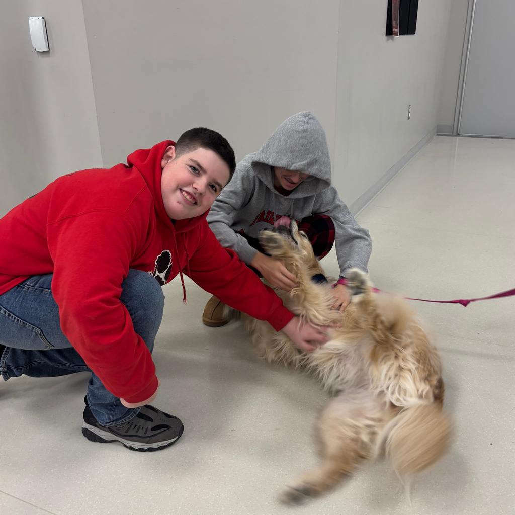 2 students with one dog