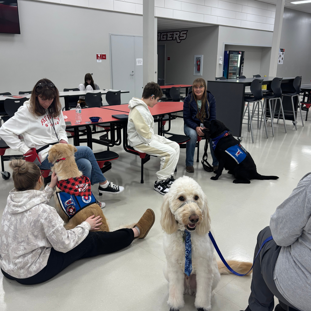 3 students with 3 dogs