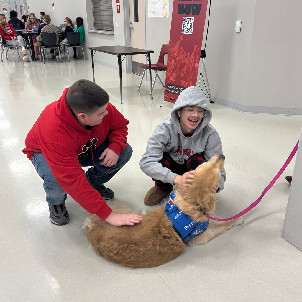 2 students with one dog