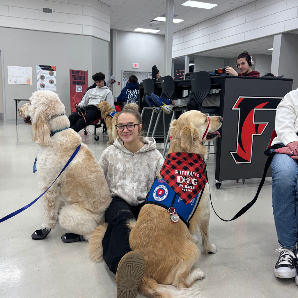 one student with 2 dogs