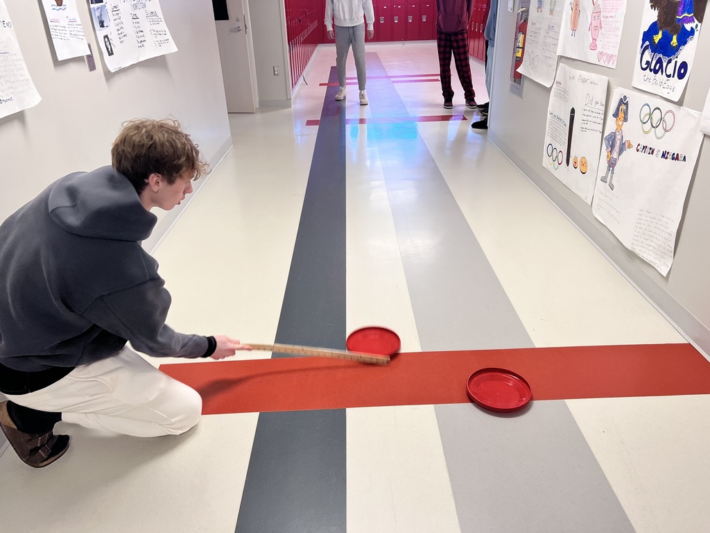 The students competed in Olympic trivia, classroom curling, paper football ski jumping and a hallway biathlon.