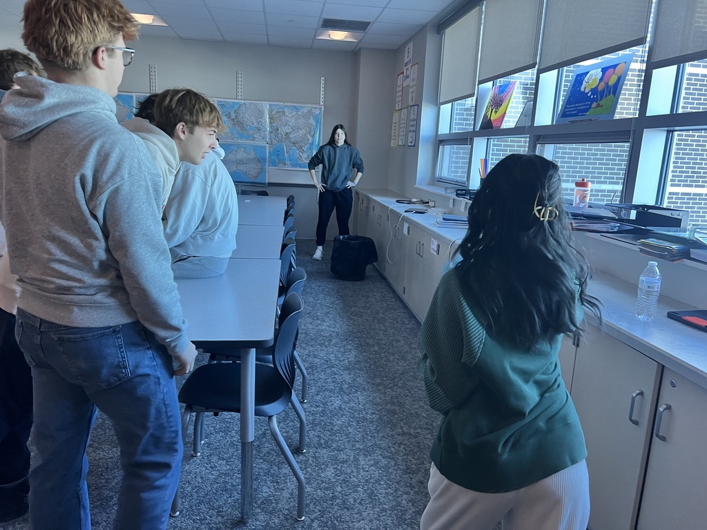 The students competed in Olympic trivia, classroom curling, paper football ski jumping and a hallway biathlon.