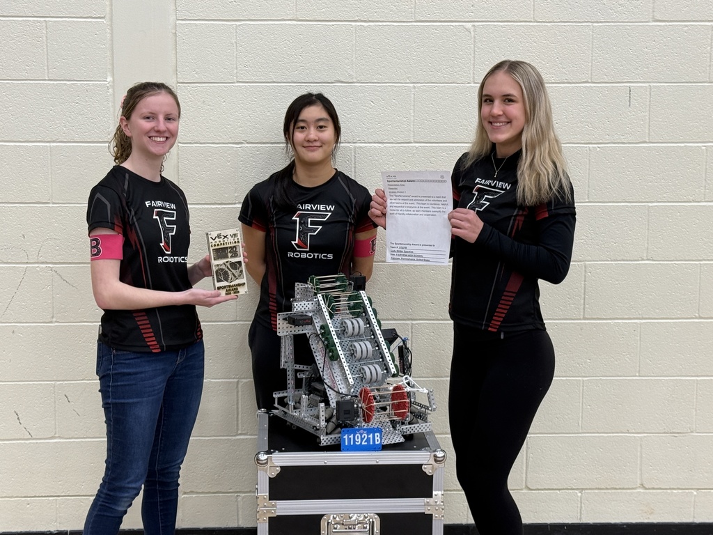 students with a robot