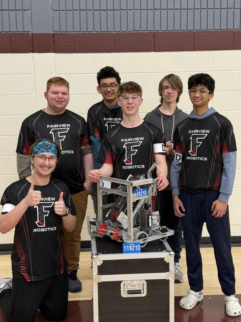 students with a robot