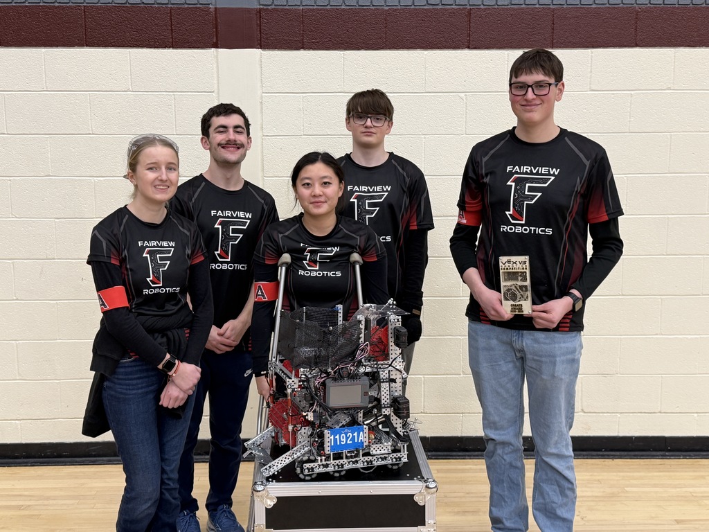 students with a robot