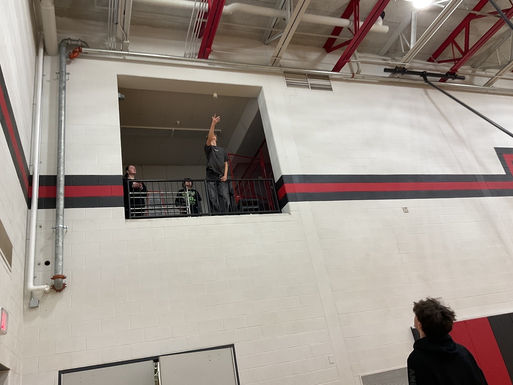 student throwing ball
