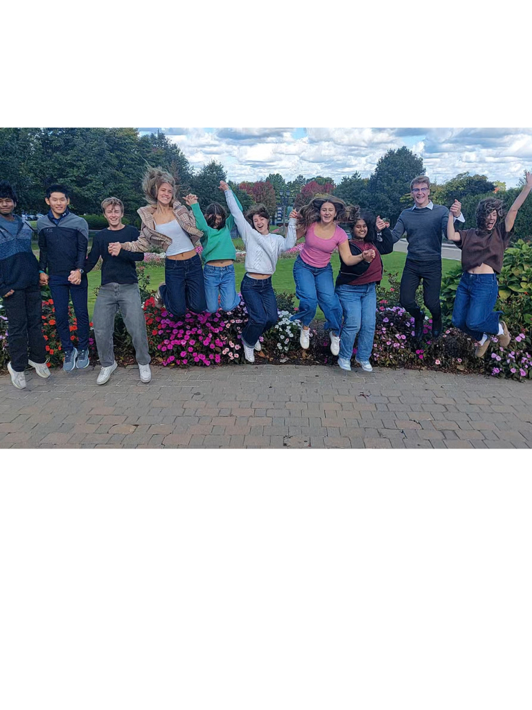 students jumping in the air