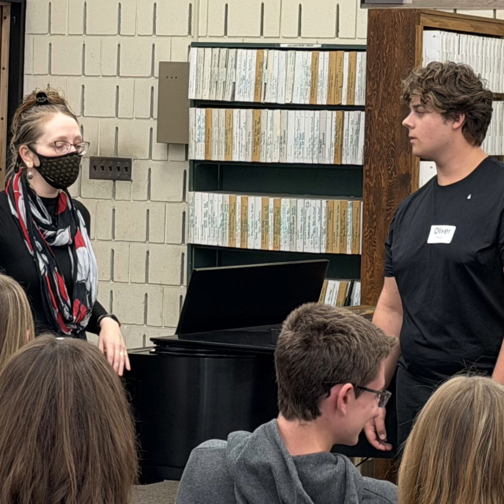 student with voice teacher