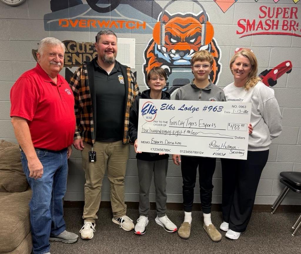 Pictured (from left to right): Elks Lodge representative, Roger Lampe, FCT ESports Coach, Kory Huppert, FCT ESports team members, Kreighton Huppert and Leo Rue, and Elks Lodge representative, Racy Hullman.