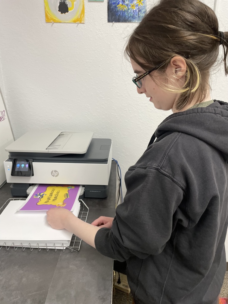 Student uses the new printer for a project.