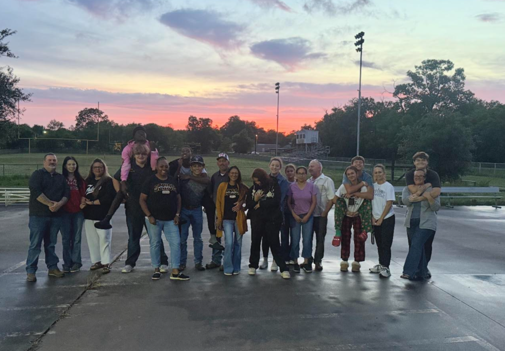 Sunset picture of the Fannindel HS graduating class of 2026  with family.