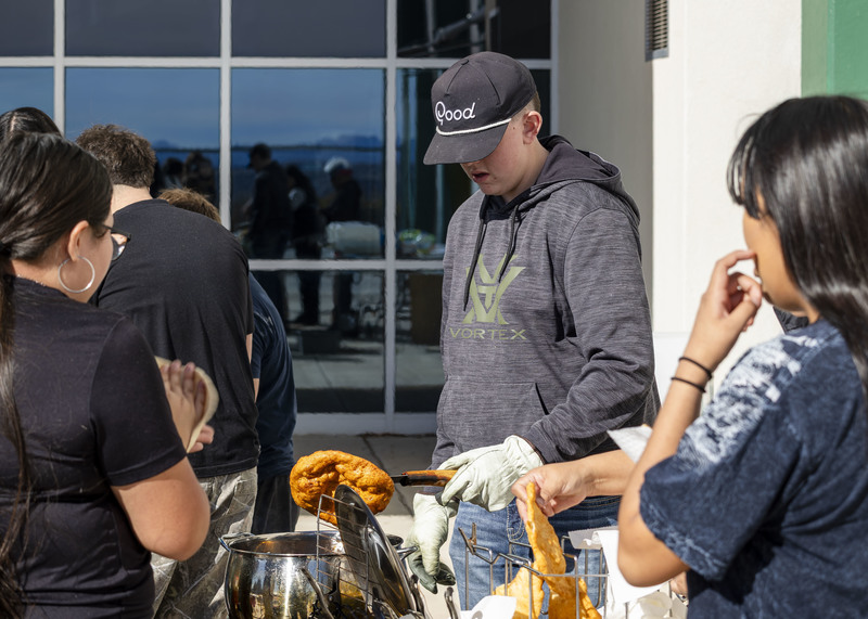 Students learning how to make fry bread