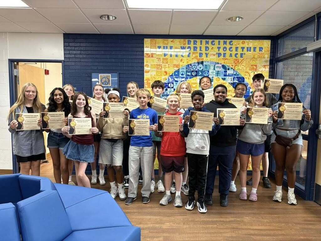 Farmington Junior Honor Society members who maintained a high GPA and completed at least 10 hours of community service.
