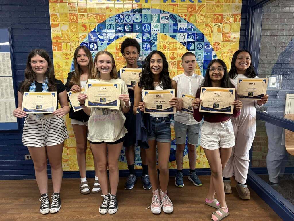 Farmington Junior Honor Society members who maintained a high GPA and completed at least 10 hours of community service.