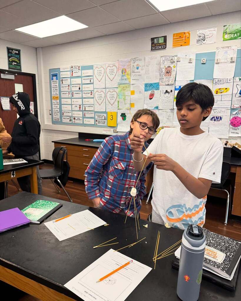 6th Grade students working on a science project.