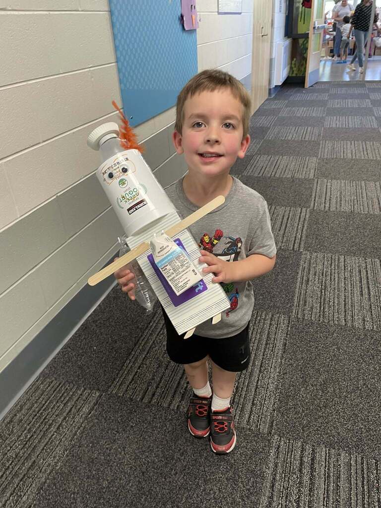 FECC Student with his Science Fair project.