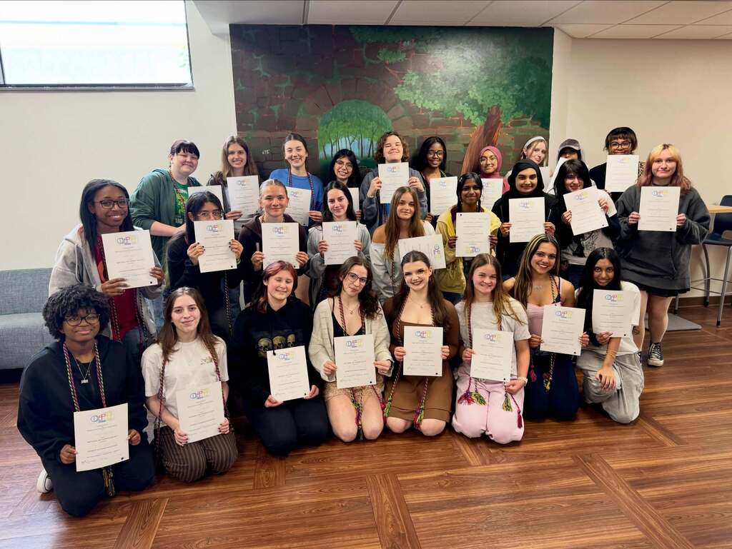 NAHS Students from FHS posing for a photo and each holding a certificate.