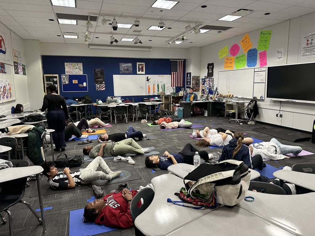 Students participating in a yoga session during FHS' Mental Health Resource Fair.